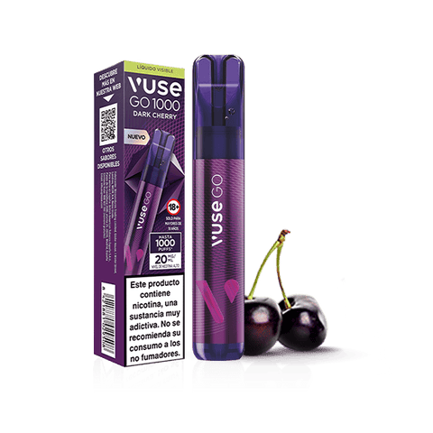 Un vaper desechable Vuse Go 1000 - Cereza de Vuse y su caja se muestran junto a dos cerezas frescas. El dispositivo morado tiene un diseño elegante, y el envase muestra información sobre el producto y una advertencia sanitaria en español.