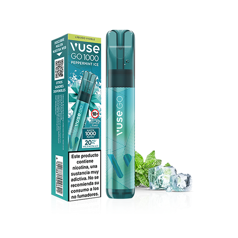 Un vaporizador desechable Vuse Go 1000 - Menta Ice junto a su caja verde azulado, ambos con hojas de menta, cubitos de hielo y advertencias en español. El dispositivo y el envase presentan texto y gráficos en blanco. Marca: Vuse.